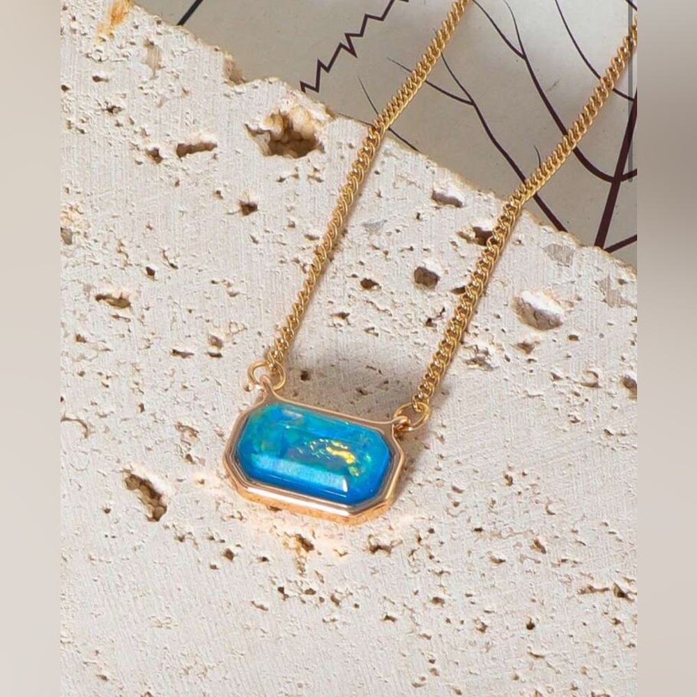 Gold Tone Necklace with Blue Stone Pendant